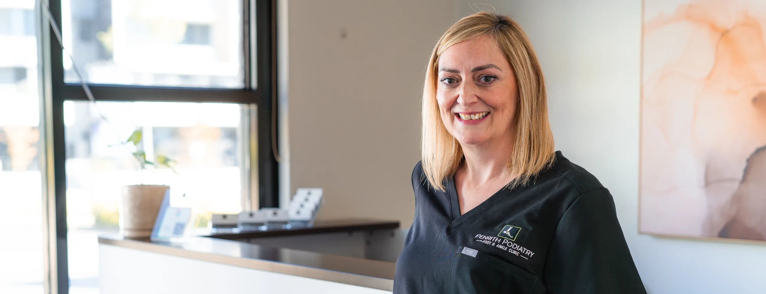 Reception team member at the front desk of Penrith Podiatry Foot and Ankle Clinic on High Street, Penrith