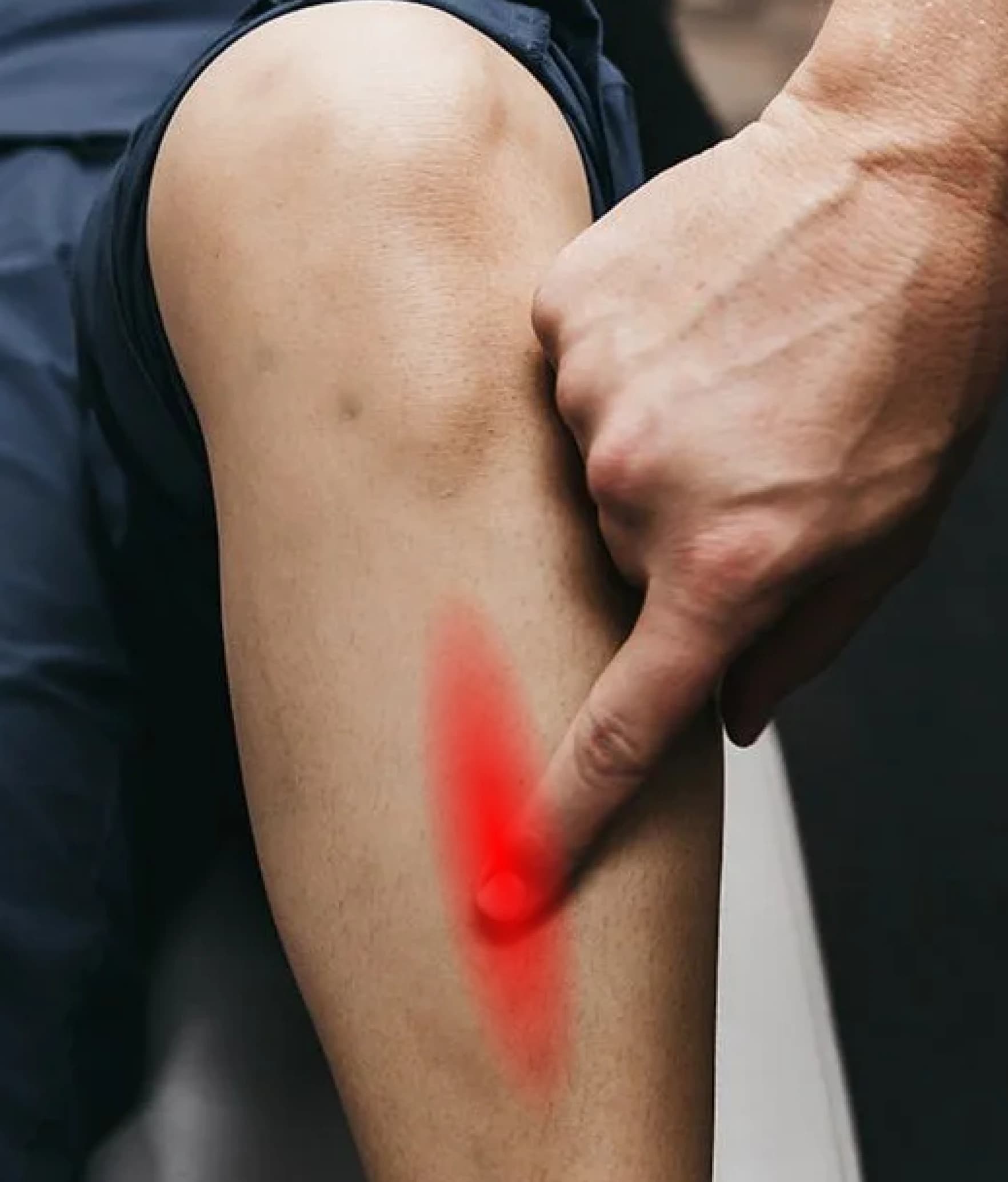 The inner shin highlighted, where shin splints cause pain