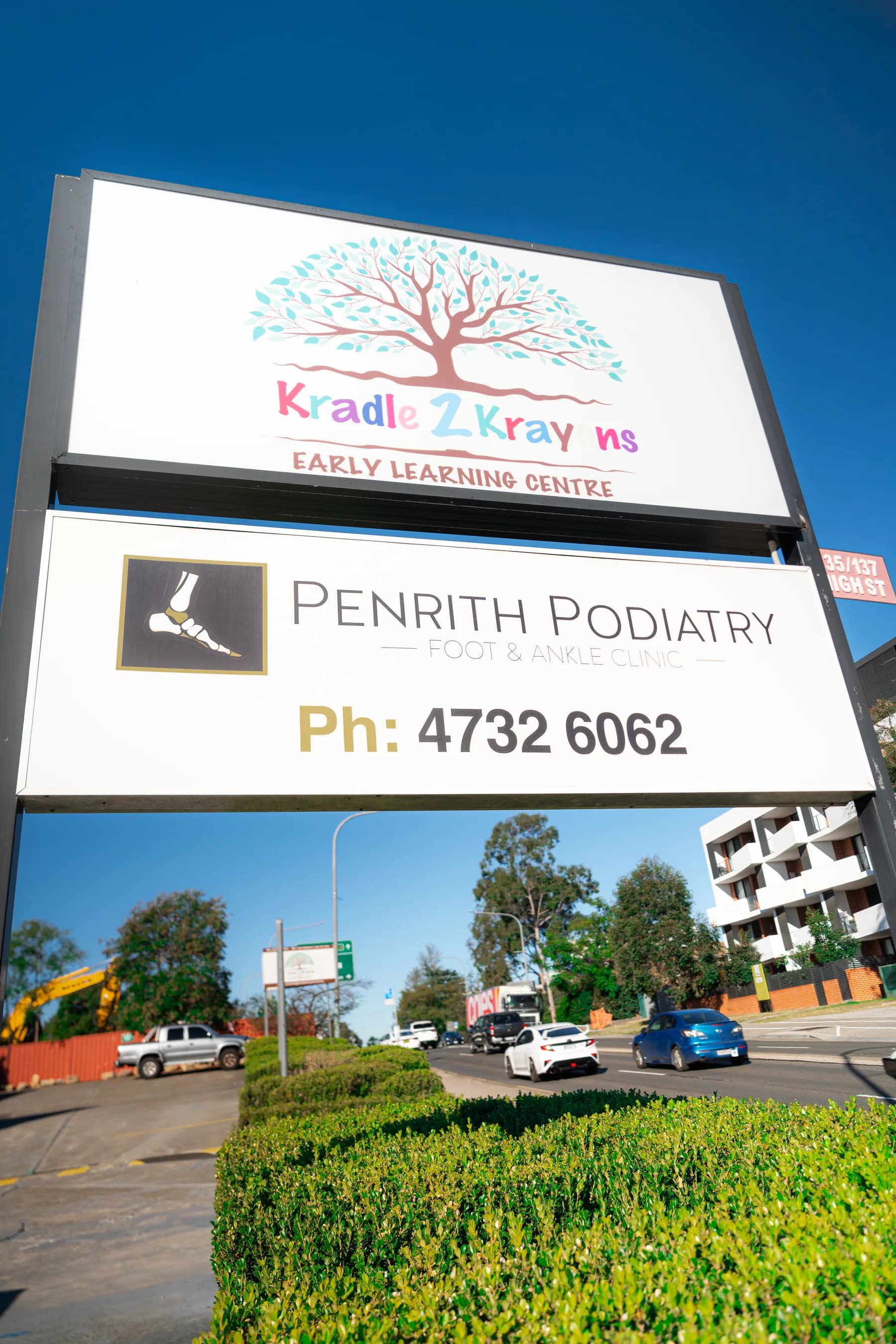 Podiatrist examining a patient's foot at Penrith Podiatry Foot and Ankle Clinic