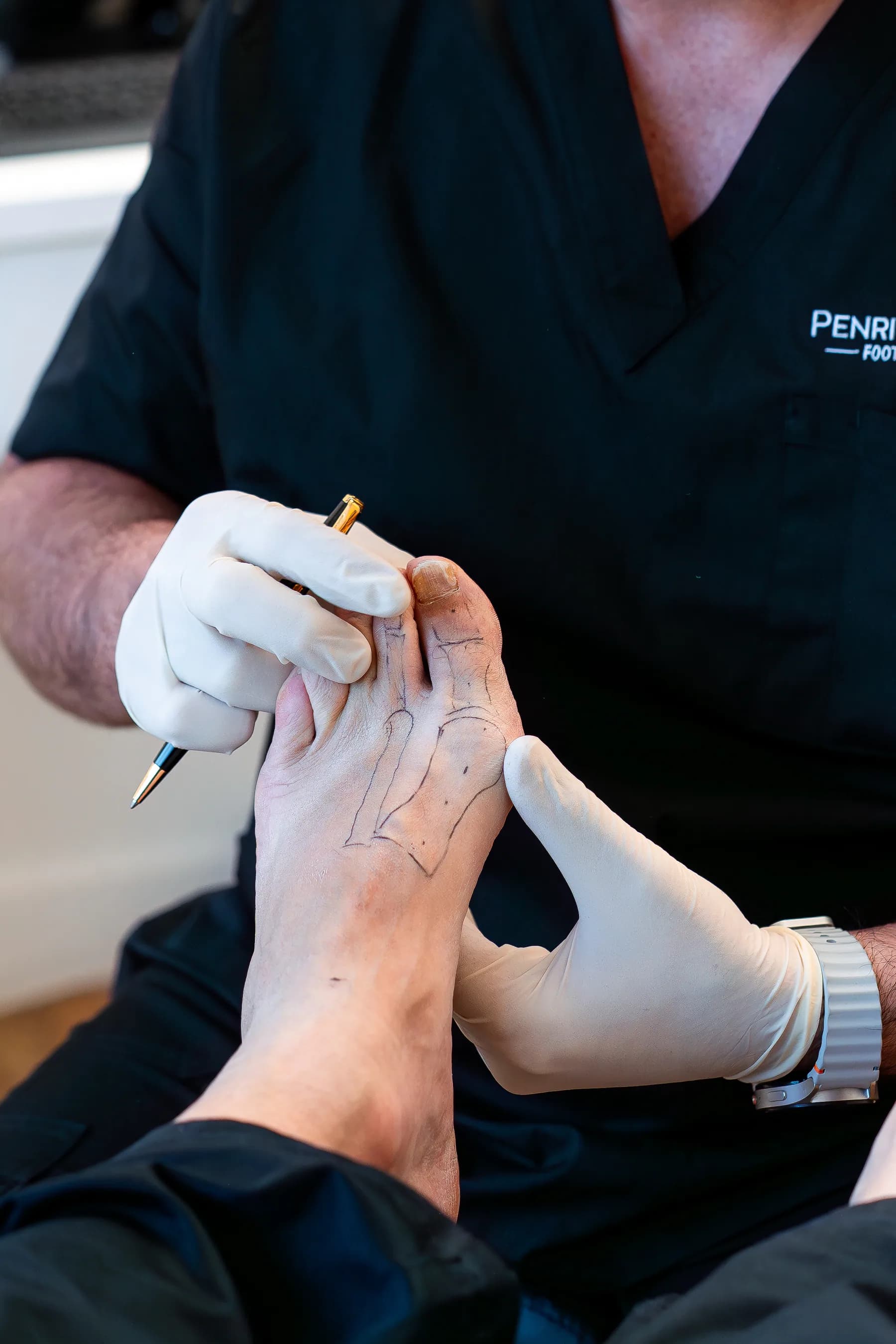 Podiatrist performing a diabetic foot check at Penrith Podiatry Foot and Ankle Clinic
